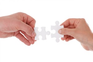 hands-holding-jigsaw